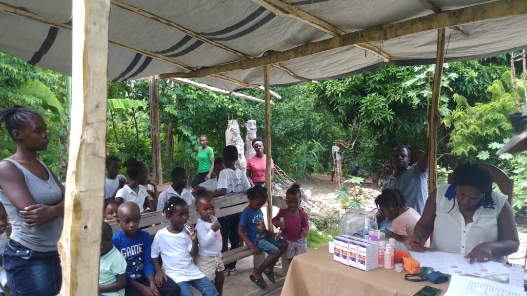 Outdoor Clinic Under a Tarp Shelter